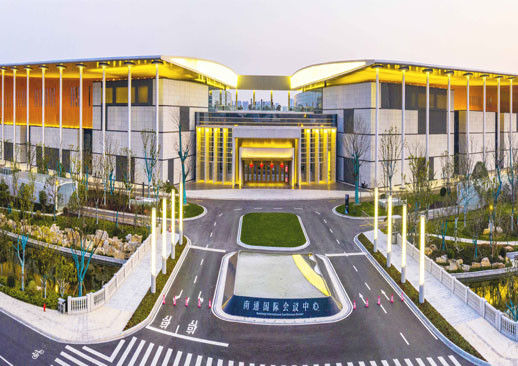 качество  The form of a pavilion with two wings organizes function and space of Nantong International Convention and Exhibition Ce завод